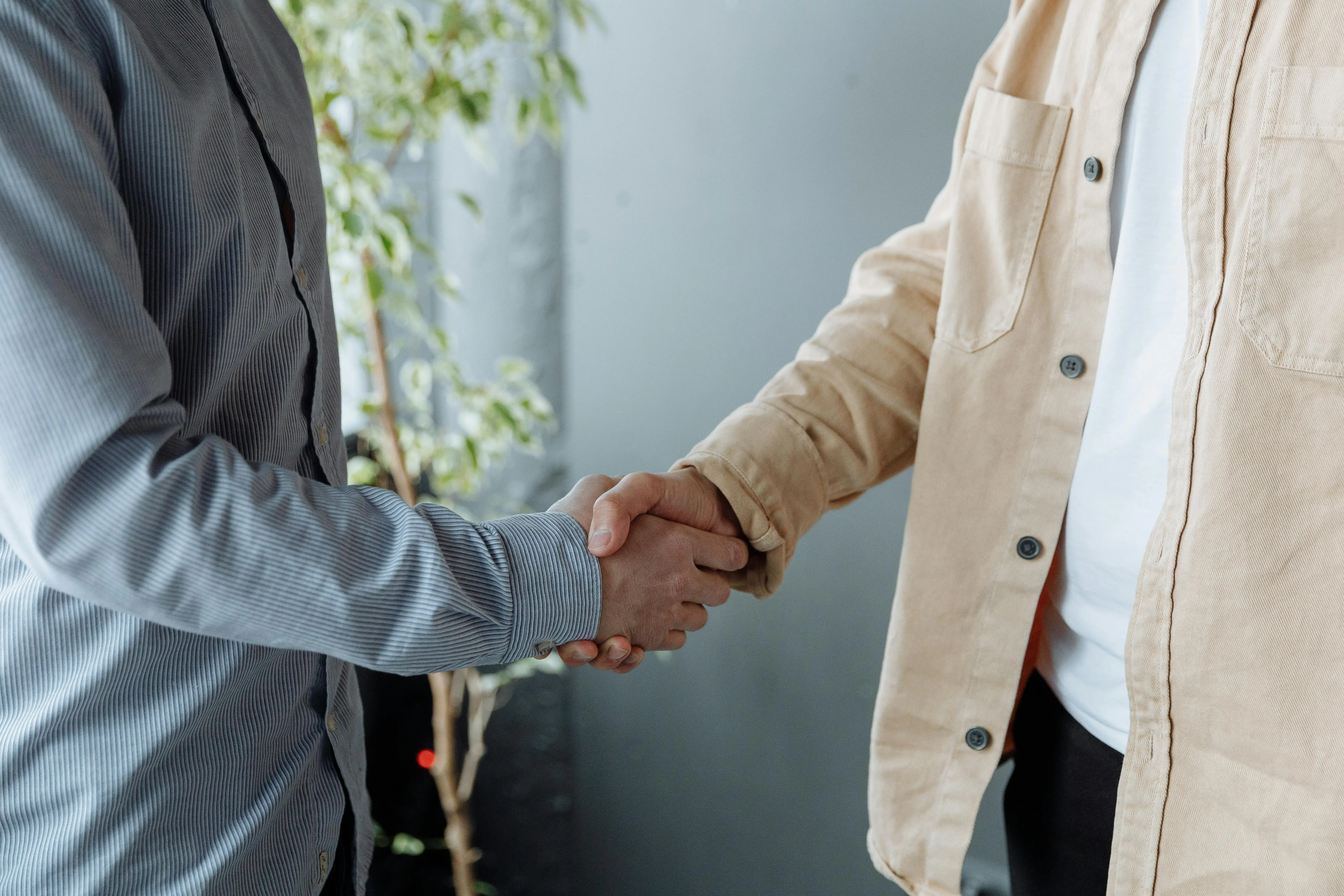 Sealing an agreement with a handshake